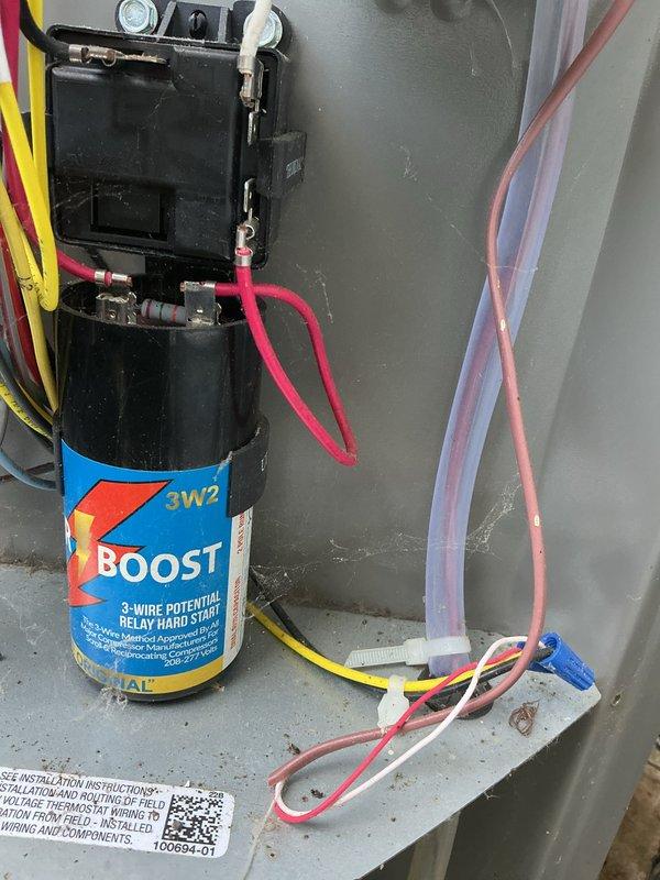 Completed annual maintenance on 3-year-old air conditioning system. Performed electrical diagnostics using clamp meter to verify proper amperage draw and installed hard start kit with 3-wire potential relay and boost capacitor to improve compressor performance. Inspected refrigerant lines, verified connections at service valves, and ensured all electrical components were functioning within manufacturer specifications.