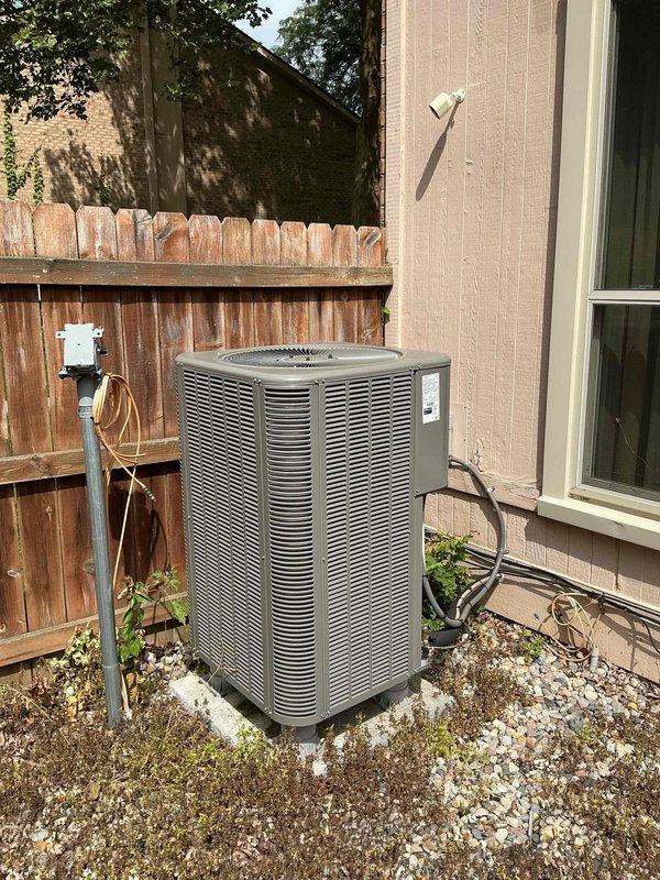 Completed comprehensive maintenance inspection on 2-year-old residential air conditioning system. Performed visual examination of outdoor condensing unit, verified proper electrical connections at capacitor and control board, and inspected refrigerant line connections running to indoor unit. All components operating within normal parameters with no deficiencies noted.