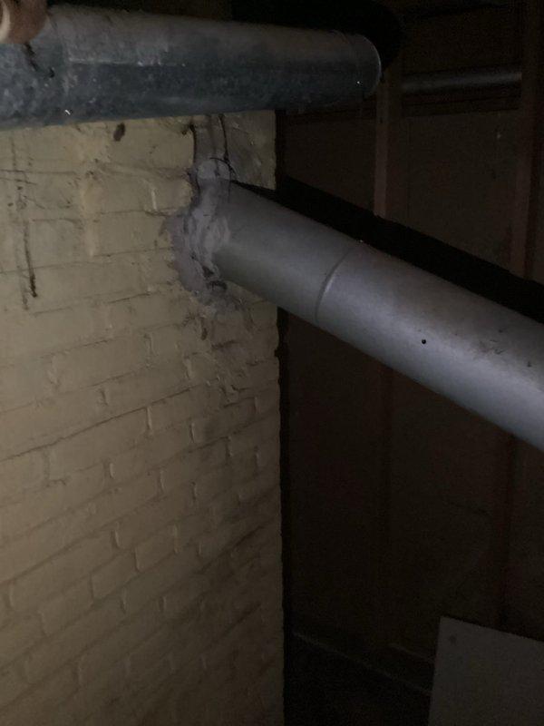 Conducted comprehensive assessment of existing steam boiler system in basement mechanical room for replacement estimate. Evaluated current boiler unit mounted on metal stand with multiple copper piping connections, flexible metal conduit, and associated ductwork infrastructure throughout the space. Documented equipment condition, existing piping configuration, and spatial constraints to determine appropriate replacement specifications and installation requirements.