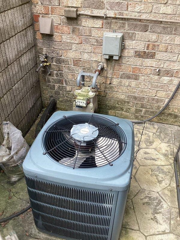 Conducted comprehensive assessment of existing residential HVAC system for air conditioning replacement estimate. Evaluated current Lennox furnace installation in basement utility area, including ductwork configuration, condensate drainage system, and overall equipment accessibility. Documented outdoor condenser unit positioned against exterior brick wall, noting unit age, condition, and electrical service connections. Assessed existing infrastructure including gas meter proximity, electrical junction box placement, and drainage considerations. Photographed indoor and outdoor components to provide detailed documentation for replacement equipment specifications and installation planning.