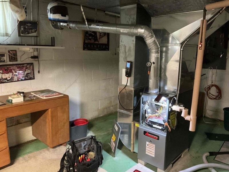 Completed scheduled maintenance on 14-year-old gas furnace system. Performed comprehensive heating season inspection including filter replacement, burner cleaning, heat exchanger examination, blower motor lubrication, and safety control testing. All components found operating within normal parameters and system returned to service.