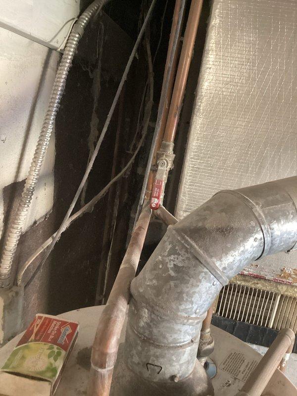 Completed estimate for full HVAC system replacement at vacant residential property. Assessed existing Conquest 90 furnace and air conditioning system in basement utility room, documented equipment specifications and current installation configuration including ductwork connections, and provided replacement recommendations for both heating and cooling units.