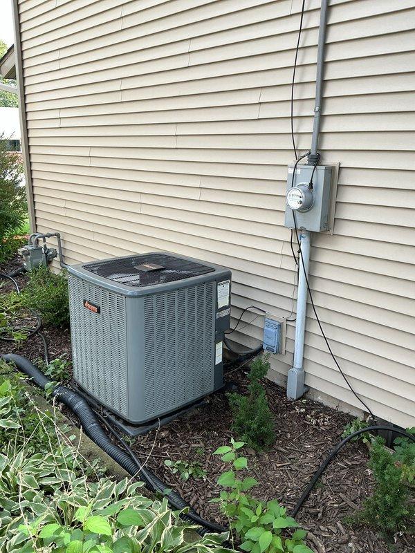 # HVAC Service Completed

Responded to no cooling complaint on residential air conditioning system. Upon arrival, performed visual inspection of outdoor condensing unit and associated components. 

Found evaporator coil heavily contaminated with dirt, dust, and debris accumulation, significantly restricting airflow through aluminum fins. The excessive buildup was preventing proper heat transfer and causing system performance degradation. Documented condition with photographs showing extent of contamination on coil fins and surrounding components.

Inspected electrical connections, refrigerant lines, and condensate drainage system. Verified unit positioning on concrete pad and checked conduit routing from electrical meter to condensing unit. All electrical connections and line sets appeared secure with proper insulation intact.

Cleaned evaporator coil thoroughly to restore airflow and heat transfer efficiency. Removed accumulated debris from fins and surrounding areas. Verified condens
