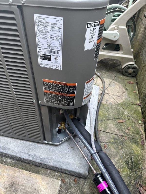 Completed full HVAC system installation including upflow cased coil in cabinet configuration utilizing existing ductboard infrastructure. Installed new 3/4-inch refrigerant line set with 30-foot run to accommodate repositioned outdoor condensing unit. Relocated Lennox condenser unit 3 feet from gas meter to meet safety clearance requirements and mounted equipment on new concrete pad. Installed new electrical disconnect and whip for proper power supply to outdoor unit. Successfully reused existing Ecobee thermostat, verifying compatibility and proper communication with new system. All refrigerant lines properly insulated and secured, system charged to manufacturer specifications, and unit tested for proper operation across all modes.