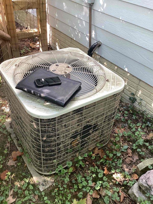 Completed comprehensive HVAC system evaluation for full equipment replacement, assessing both the outdoor condensing unit located on exterior wooden deck platform and the indoor air handling unit positioned in basement mechanical room. Documented existing system configuration including electrical conduit routing, ductwork connections, and current equipment placement to provide accurate replacement specifications and installation requirements.