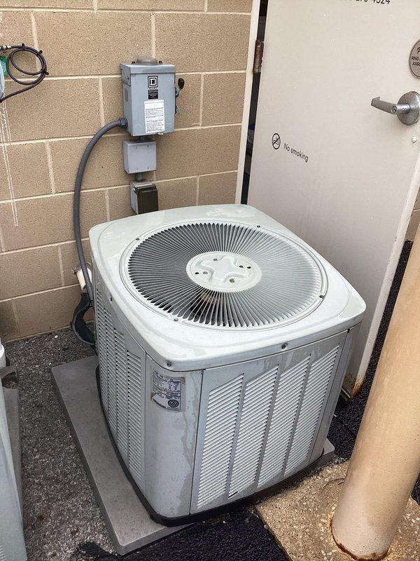 Conducted comprehensive assessment of existing HVAC system including outdoor condensing unit and indoor air handler to provide replacement estimate. Evaluated current equipment condition, verified electrical disconnect and power supply configuration, documented existing ductwork connections and determined full system replacement requirements based on equipment age and operational status.