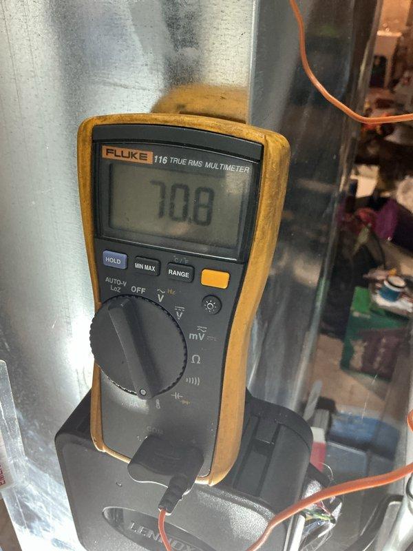 Performed scheduled heating maintenance on 10-year-old system. Inspected control board and electrical connections, verified all wire terminations secure and free of damage. Measured and recorded system voltage at 70.8V using calibration-grade multimeter. All components operating within normal parameters, no deficiencies noted.