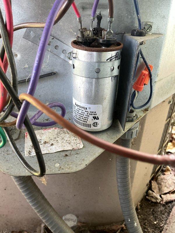 Responded to no-cooling complaint on 15-year-old residential air conditioning system. Upon arrival, performed diagnostic evaluation of outdoor condensing unit and electrical components. Testing revealed failed run capacitor preventing compressor and condenser fan motor operation. Replaced defective AEROVOX capacitor with proper replacement rated for system specifications. Verified all electrical connections secure at capacitor terminals and contactor. Started system and confirmed compressor and condenser fan motor operation restored. Unit cooling properly at time of departure.