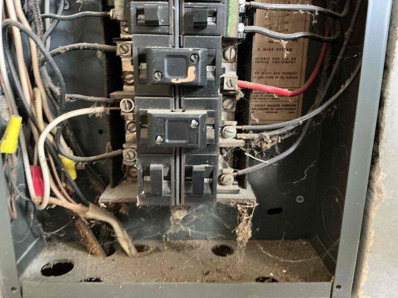 # HVAC Service Completed

Responded to service call for 16-year-old air conditioning system with reduced airflow and insufficient cooling throughout home. Customer reported drain functioning properly and filter recently replaced.

Upon arrival, performed comprehensive system diagnostics. Accessed electrical panel to inspect power supply and circuit protection for outdoor condensing unit. Panel inspection revealed significant accumulation of dust, debris, and cobwebs indicating lack of recent maintenance, though all circuit breakers were functioning properly and connections were secure.

Proceeded to outdoor unit for electrical testing. Using digital clamp meter, measured amperage draw on compressor circuit, which registered 0.50 amps—significantly below normal operating range for a residential AC compressor. This abnormally low amperage reading indicated compressor failure or loss of refrigerant charge preventing compressor from running under load.

Given the age of the system at 16 ye