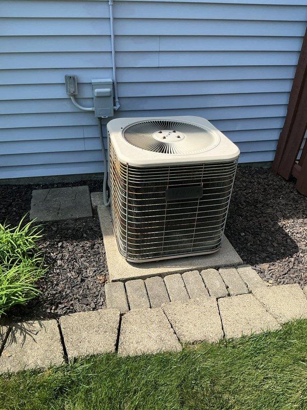 Responded to no cooling call on 22-year-old residential air conditioning system. Upon arrival, performed complete system diagnostic on outdoor condenser unit. Inspected compressor operation, refrigerant lines, electrical connections, and capacitor function. Evaluated condenser coil condition and verified proper airflow through unit. Tested thermostat communication and electrical supply at disconnect. Given the advanced age of the equipment and observed wear patterns, discussed system condition and replacement options with homeowner. Unit operational at time of departure with recommendations provided for future consideration.