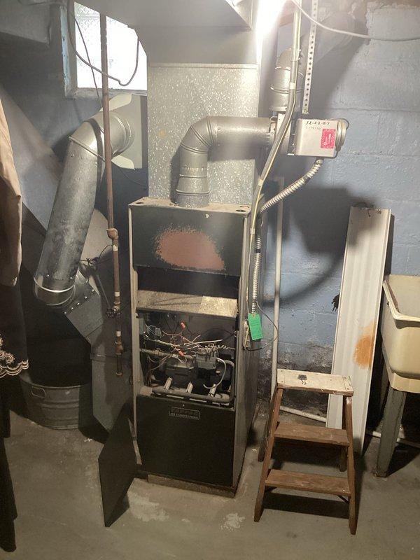 Responded to Columbia Gas red tag notice for furnace and gas service disconnection due to cracked heat exchanger. Conducted thorough inspection of existing furnace unit in basement mechanical room, confirmed heat exchanger failure presenting safety hazard from potential carbon monoxide exposure. Documented existing equipment condition including internal components, ductwork connections, and exterior venting system showing signs of age and corrosion. Provided comprehensive estimate for complete HVAC system replacement including new furnace installation, gas line reconnection upon successful inspection, ductwork modifications as needed, and proper venting to meet current safety codes.