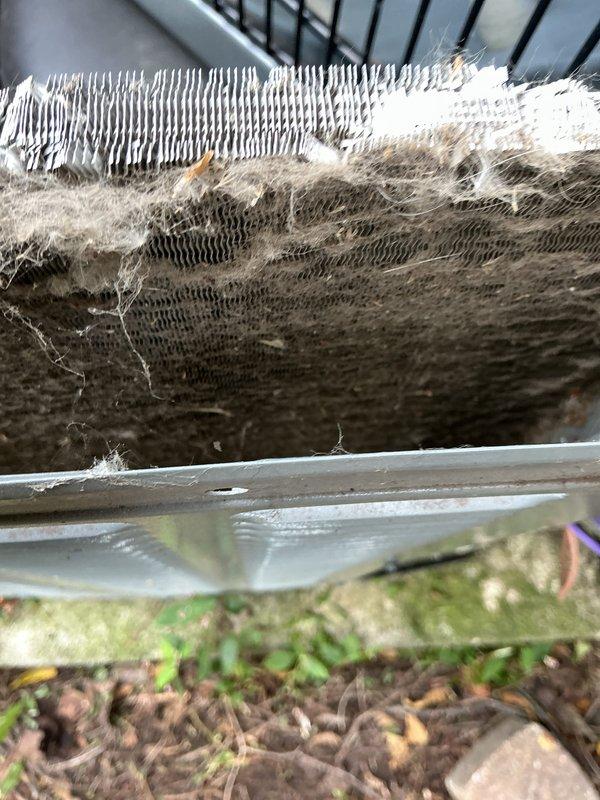 Completed comprehensive tune-up service on both 11-year-old air conditioning and furnace systems. During AC inspection, discovered evaporator coil with significant debris accumulation including dust, lint, and fibrous material heavily restricting airflow and reducing system efficiency. Thoroughly cleaned evaporator coil fins, removing dense layers of contamination to restore proper heat transfer and airflow capacity. Performed standard maintenance procedures including checking refrigerant levels, inspecting electrical connections, verifying proper system operation, and ensuring equipment alignment. Furnace inspection revealed satisfactory condition with all electrical connections secure and properly terminated. Completed full system diagnostics on both units, confirmed proper operation, and restored systems to optimal performance standards.