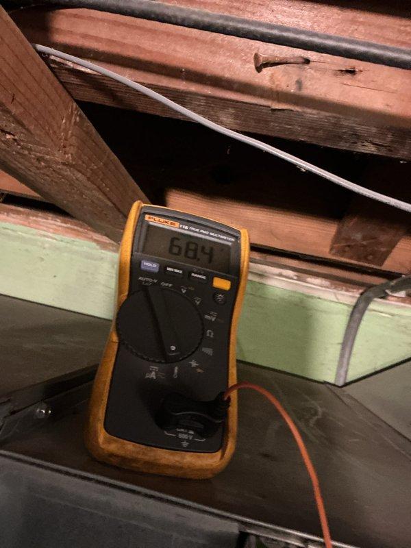 Completed comprehensive heating maintenance on a 10-year-old gas furnace system. Performed electrical diagnostics using digital multimeter to verify proper voltage and amperage readings throughout the system, with measurements indicating normal operating parameters. Inspected and serviced condensate pump assembly mounted in overhead location, checking electrical connections and ensuring proper drainage function for continued reliable operation during heating season.
