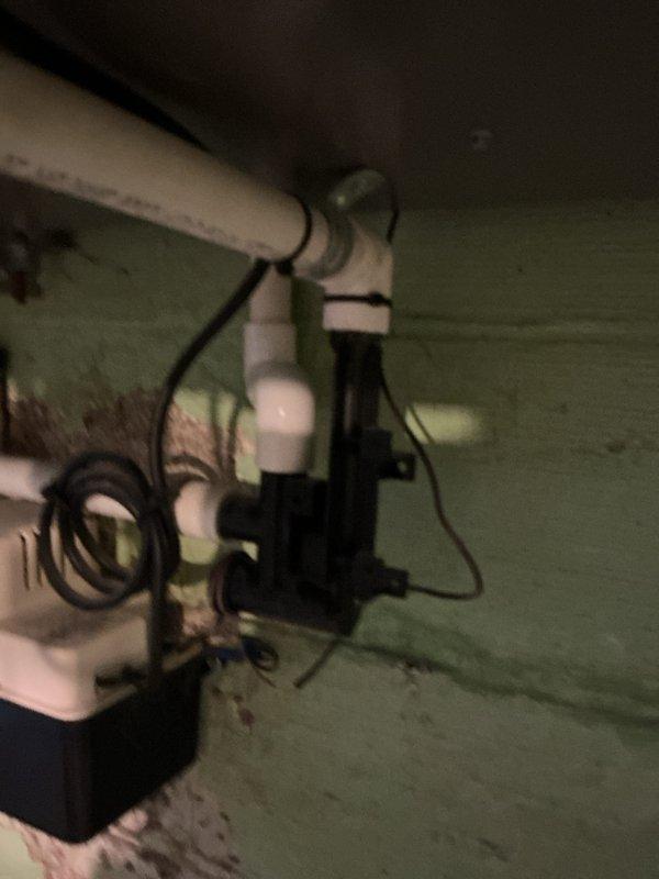 Completed comprehensive heating maintenance on a 10-year-old gas furnace system. Performed electrical diagnostics using digital multimeter to verify proper voltage and amperage readings throughout the system, with measurements indicating normal operating parameters. Inspected and serviced condensate pump assembly mounted in overhead location, checking electrical connections and ensuring proper drainage function for continued reliable operation during heating season.