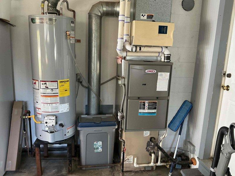 Completed comprehensive tune-up on 20-year-old residential air conditioning system with Lennox furnace and outdoor condenser unit. Performed standard maintenance protocol including inspection of indoor and outdoor components, filter check, electrical connections, refrigerant levels, and system performance evaluation to address reported cooling deficiency. Customer advised of system age and current operational status with recommendations for optimal performance.
