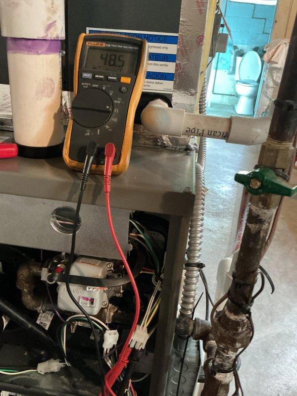 Completed comprehensive furnace tune-up on 11-year-old unit, performing all standard maintenance procedures including filter replacement with new pleated media filter, electrical system diagnostics with multimeter readings confirming proper voltage at 485V, and full inspection of all mechanical components, wiring harnesses, and refrigeration lines which showed normal operational wear patterns consistent with unit age.