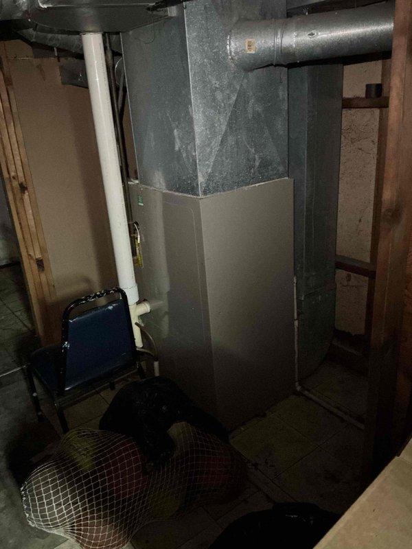 Responded to no-cooling call on 9-year-old outdoor condensing unit. Upon arrival, confirmed blower motor was operating but system was not producing cold air. Inspected outdoor unit components and identified failed capacitor preventing compressor from engaging. Replaced defective dual-run capacitor and verified proper voltage readings. Tested system operation and confirmed unit now cooling properly with compressor and condenser fan motor running within normal parameters.