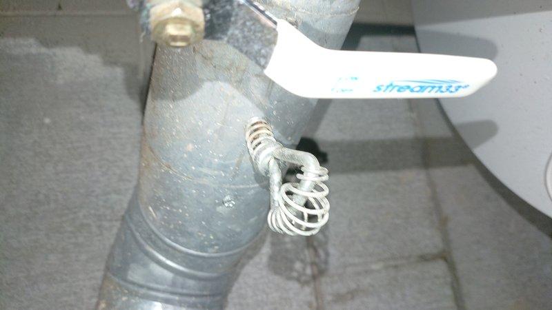 Responded to service call for HVAC system evaluation following gas company intervention due to external construction work. Upon arrival, found water heater shut off by Columbia Gas and flue system showing elevated CO2 readings as reported by utility company. Performed comprehensive inspection of 5-year-old central heating and air conditioning system using combustion analyzer to verify flue gas composition and identify source of improper venting. Documented current conditions with photos showing moisture accumulation on flue piping and condensation issues in utility area. Testing confirmed flue repair required to restore safe operation and proper venting of combustion gases. System remains offline pending flue remediation to ensure safe operation and code compliance.