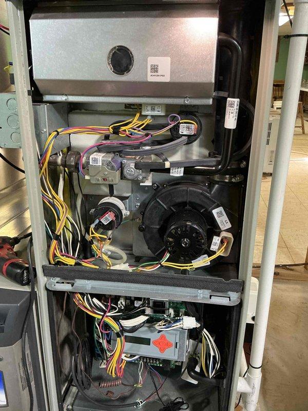 Completed comprehensive heating maintenance on Trane gas furnace system. Performed full system inspection including burner assembly, heat exchanger, blower motor, gas valve controls, and electrical components. Verified proper operation of intake and exhaust PVC venting, tested all safety controls, and confirmed efficient combustion. System operating within manufacturer specifications with all components functioning properly.