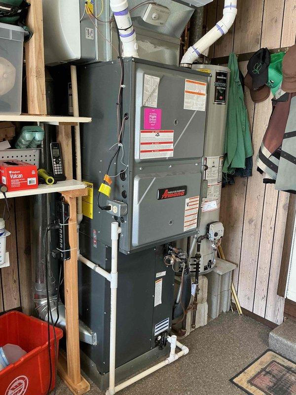 Completed preventive maintenance on 6-year-old furnace unit located in garage utility area. Performed comprehensive system inspection including visual examination of heat exchanger, burner assembly, and all mechanical components. Checked and tested all electrical connections, control wiring, and safety devices. Inspected condensate drain lines and PVC venting system for proper operation and clearances. Verified gas line connections, tested for leaks, and confirmed proper combustion. All systems operating within manufacturer specifications with no deficiencies noted.