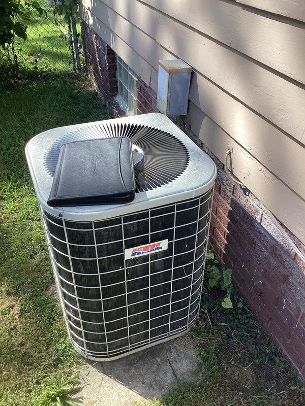Conducted comprehensive assessment of existing residential HVAC system for complete replacement. Evaluated outdoor condensing unit positioned on concrete pad adjacent to home exterior and indoor furnace installation in basement utility area. Documented current equipment specifications, ductwork configuration, gas line connections, and electrical service. Provided detailed estimate for replacement of both heating and cooling systems with appropriate equipment sizing and installation requirements.