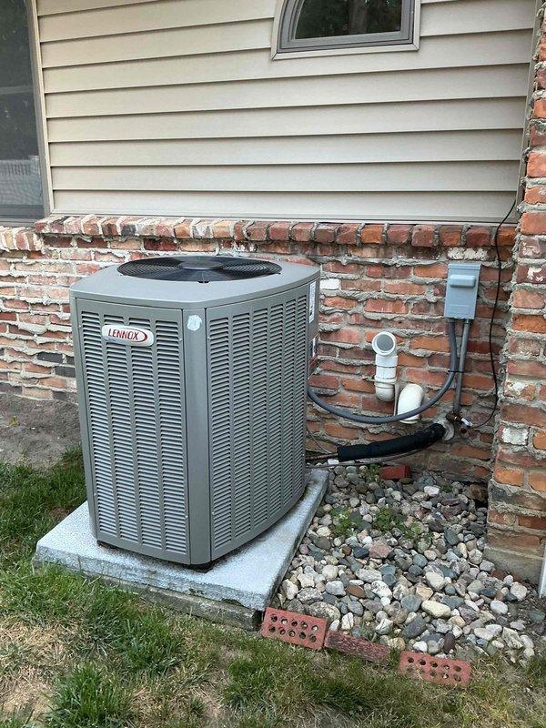 Completed seasonal tune-up on 3-year-old Lennox air conditioning system with basement-installed furnace and air handler. Performed comprehensive inspection of indoor and outdoor units, verified refrigerant levels, checked electrical connections and conduit, inspected condensate drainage system and PVC piping, cleaned condenser coils, and confirmed proper airflow through ductwork. All components operating within manufacturer specifications with no deficiencies noted.