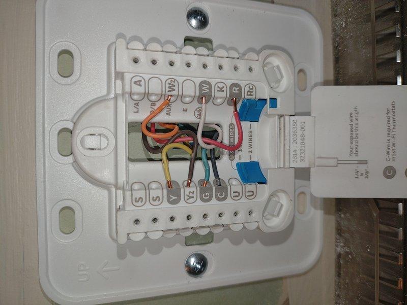 Responded to service call for newly installed rooftop air conditioning unit displaying "waiting on equipment" error at thermostat with no cooling operation. Inspected thermostat wiring and terminal connections, verified proper wire placement on control board including power, communication, and control circuits. Traced and corrected communication issue between thermostat and rooftop unit, restoring proper system operation and cooling functionality.