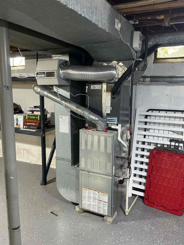 Responded to service call for 9-year-old central air conditioning system experiencing short cycling, with unit turning on and off every minute and failing to maintain temperature setpoint. Upon inspection of the HVAC system, performed diagnostic evaluation of electrical components, blower motor assembly, and control systems. Identified and resolved issue causing the rapid cycling condition. Verified proper operation of draft inducer motor, checked all electrical connections and wiring harnesses for integrity, and ensured relay and control circuits were functioning within specifications. System tested successfully after repairs, confirming unit now operates through complete cooling cycles and maintains desired temperature setting.