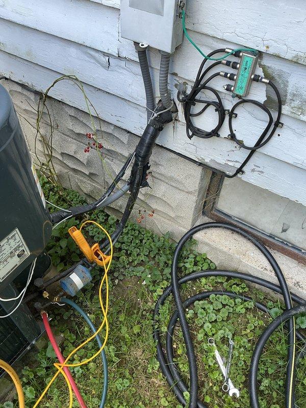 Responded to no cooling complaint at residential property. Upon arrival, connected refrigerant manifold gauges to outdoor condensing unit to diagnose system operation. Performed pressure and temperature readings on refrigerant circuit to assess system charge and operational status. Gauges indicated abnormal readings requiring further evaluation of refrigerant levels and system performance. Conducted diagnostic testing to determine root cause of cooling failure and identify necessary repairs to restore proper air conditioning function.