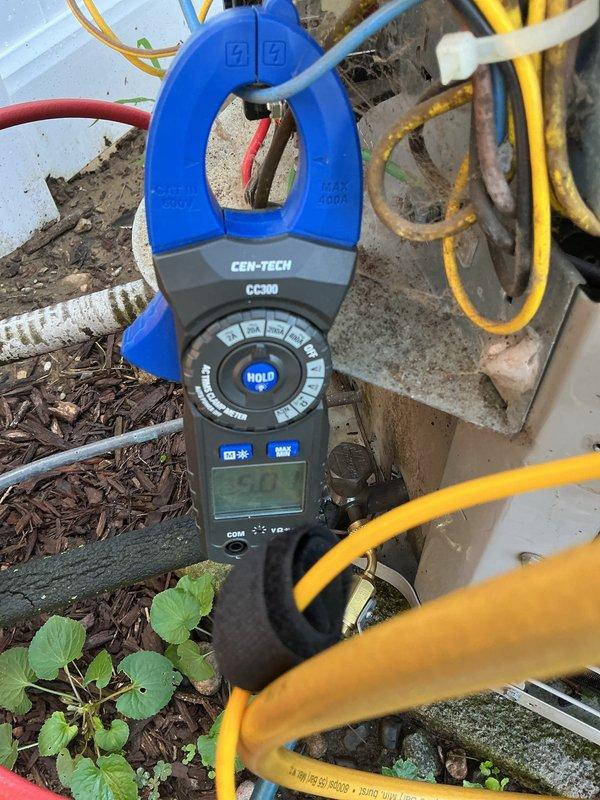 Completed comprehensive air conditioning tune-up and system inspection. Performed electrical diagnostics using clamp meter to verify proper amperage draw on compressor and condenser unit, tested all electrical connections at outdoor disconnect box, and confirmed system is operating within manufacturer specifications with no immediate safety concerns identified.