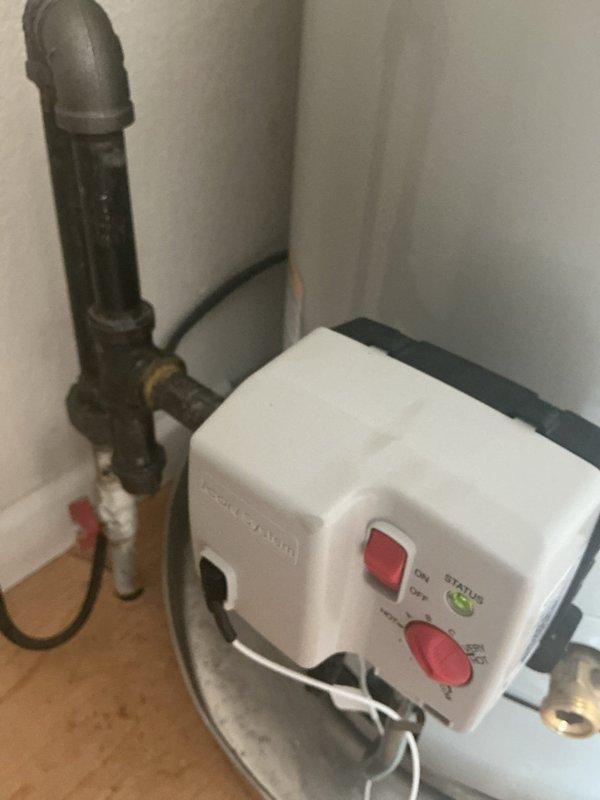 Replaced water heater per inspection report requirements and addressed multiple plumbing leaks throughout the residence. Installed new Bradford White tanked water heater with recirculation pump system, including copper supply piping, brass fittings, PVC vent piping, temperature/pressure relief valve, and electronic control unit with wall-mounted controller. Completed all connections to existing plumbing infrastructure and verified system operation upon installation.