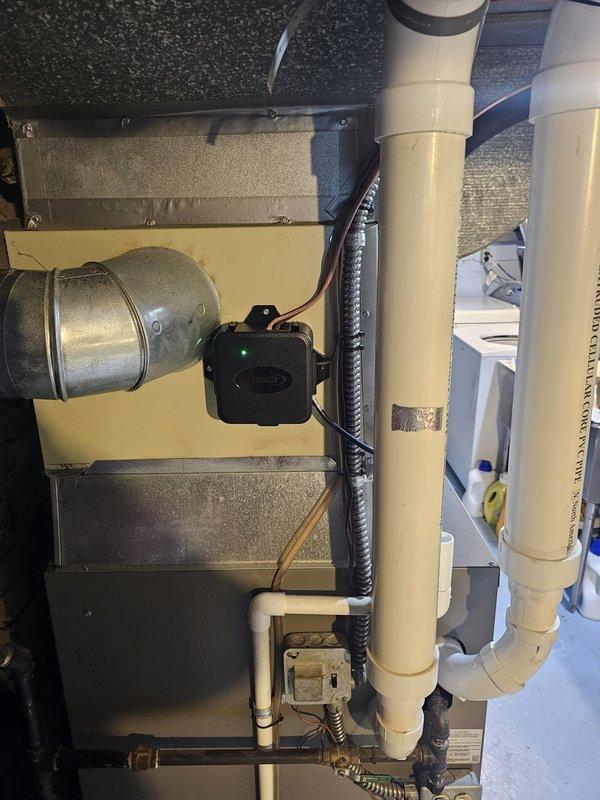 Completed full HVAC system installation including new single-stage air conditioning condenser unit and matching evaporator coil in a space-constrained indoor mechanical closet with only 20.5 inches of clearance. Fabricated custom plenum and access door to accommodate uncased coil configuration, installed 50 feet of 3/4-3/8 refrigerant lineset connecting outdoor condenser to indoor coil, and set new condenser on concrete pad with stone base. Installed new electrical disconnect and whip for outdoor unit, reused existing thermostat, and ensured all refrigerant connections, drainage lines, and electrical components were properly secured and tested for optimal system operation.
