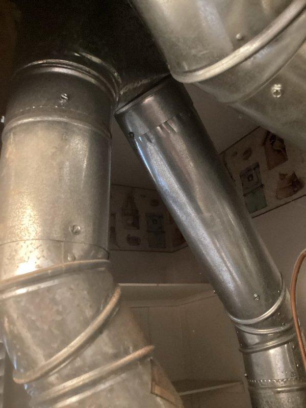 Conducted comprehensive assessment of existing HVAC system for furnace replacement. Evaluated current ductwork configuration, including galvanized sheet metal ducts and fittings with standard connection methods, and inspected mechanical utility area housing existing furnace unit. Documented equipment specifications, condensate drainage system with PVC piping, and overall installation environment to provide accurate replacement estimate including necessary modifications to existing duct connections and supporting infrastructure.