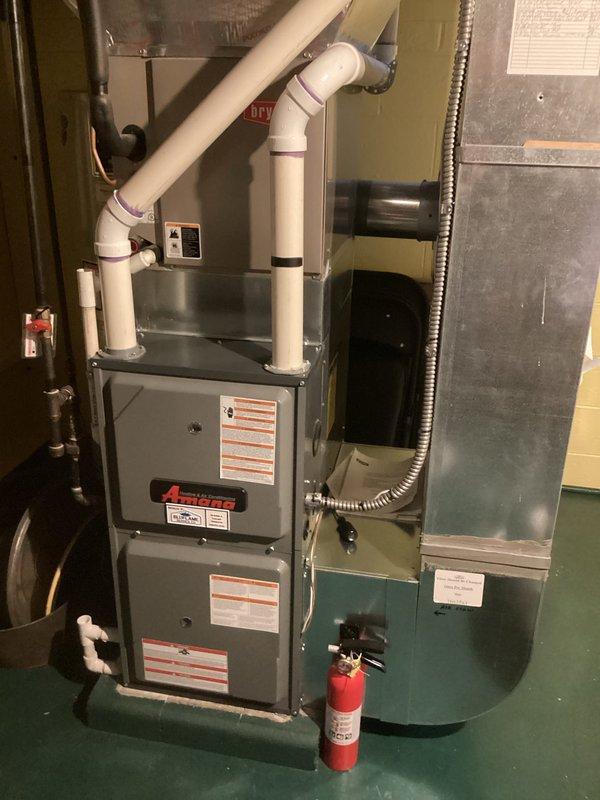 Responded to service call for 10-year-old furnace producing loud noise during startup, an ongoing issue with no new symptoms since previous visit. Performed diagnostic evaluation of heating system and documented existing equipment configuration including furnace unit, venting system with PVC exhaust piping, and ductwork connections. Provided estimate for complete HVAC system replacement based on age of equipment and recurring operational concerns.
