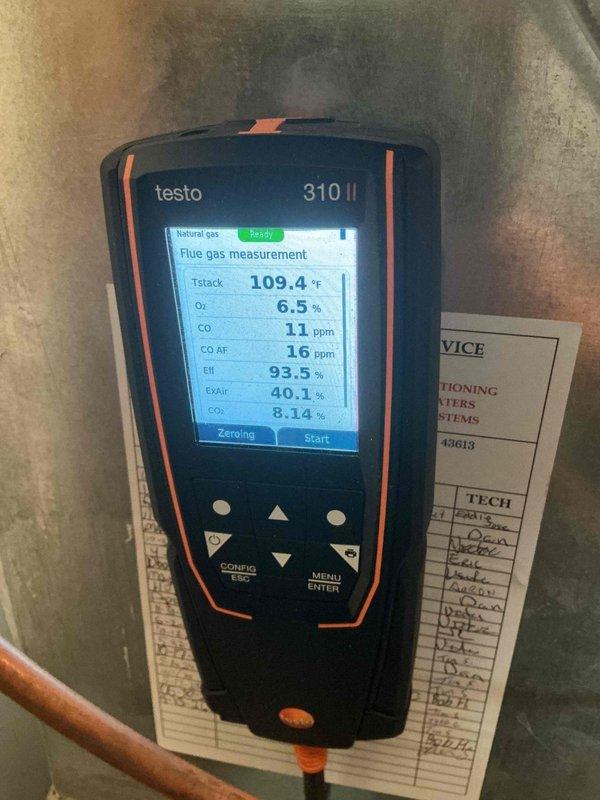 Completed comprehensive heating maintenance on 11-year-old natural gas furnace system. Performed combustion analysis using Testo 310 II flue gas analyzer, confirming optimal performance parameters with stack temperature reading 109.4°F, oxygen level at 6.5%, carbon monoxide at 11 ppm, ambient CO at 16 ppm, and combustion efficiency at 93.5%. System demonstrated proper fuel-to-air ratio with CO2 level at 8.14% and excess air at 40.1%, all within manufacturer specifications for safe and efficient operation. Inspected Amana furnace unit, Space-Gard air cleaner, and integrated Honeywell humidifier system. Verified proper operation of all components including heat exchanger, burner assembly, and venting system. Checked electrical connections, control wiring, and safety devices throughout installation. Confirmed adequate clearances and proper PVC condensate drainage. System operating safely and efficiently with no deficiencies noted.