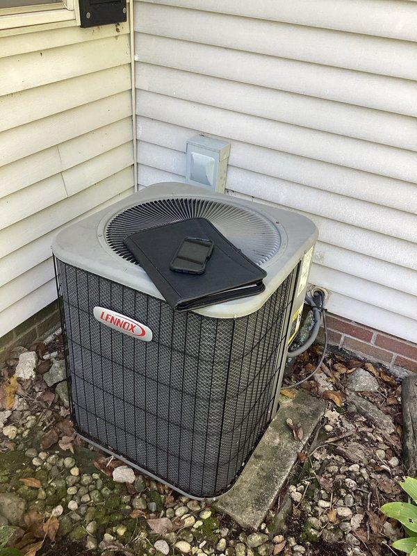 Completed comprehensive estimate for full air conditioning system replacement. Evaluated existing Lennox condensing unit located at exterior corner of residence, noting accumulated debris around equipment and aging infrastructure. Assessed interior components including drainage system, refrigerant lines, and associated plumbing connections to provide complete replacement specifications for new HVAC system installation.