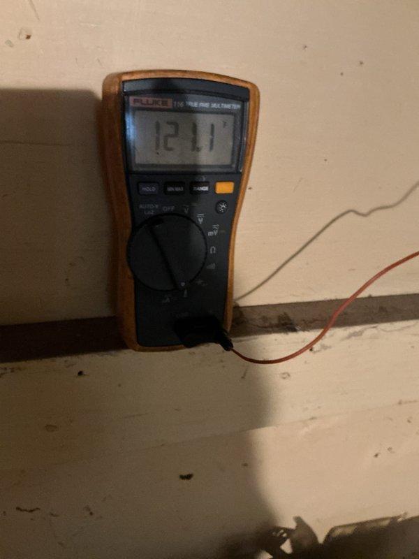 Completed comprehensive furnace tune-up including full system diagnostics and safety checks. Verified proper electrical operation with multimeter readings showing 12.1V at control board, inspected all wire connections and internal components including capacitor and relay assembly, and confirmed system is operating safely and efficiently for the heating season.