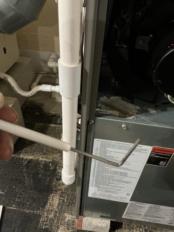 Completed scheduled heating maintenance on 3-year-old HVAC system. Performed comprehensive inspection of furnace unit, verified electrical readings using multimeter showing system operating within normal parameters, and inspected condensate drainage piping for proper function. All components found in good working order with no issues identified during maintenance visit.