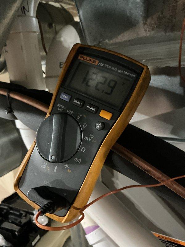 Completed scheduled heating maintenance on 3-year-old HVAC system. Performed comprehensive inspection of furnace unit, verified electrical readings using multimeter showing system operating within normal parameters, and inspected condensate drainage piping for proper function. All components found in good working order with no issues identified during maintenance visit.