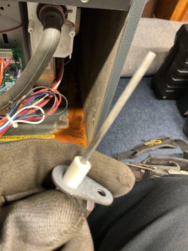 Performed comprehensive air conditioning tune-up on 5-year-old system experiencing intermittent 30A fuse failures. Conducted flue gas analysis using Testo 310 II combustion analyzer, recording multiple parameters including temperature, oxygen levels, and carbon monoxide readings to verify safe operation. Inspected interior components, wiring connections, and circuit board for signs of electrical stress or thermal damage. Observed discoloration on insulation material within unit compartment, indicating possible previous overheating or moisture intrusion. Verified all wire connections are secure with proper strain relief, checked control board functionality, and confirmed no active heating or cooling function loss at time of service. System operating within normal parameters following inspection and preventive maintenance procedures.