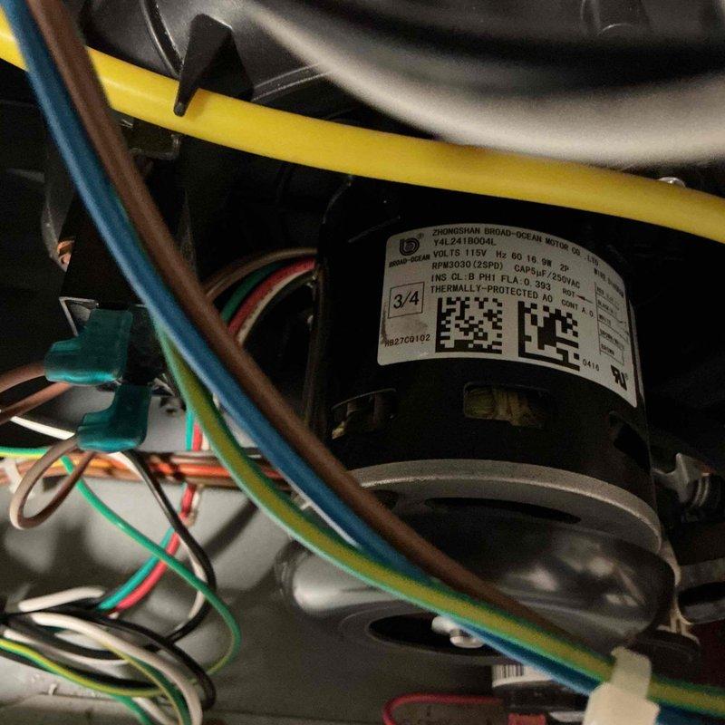 # Gas Furnace No Heat Service Call

Responded to no heat complaint on 7-year-old gas furnace. Upon inspection, found blower motor inoperative. Verified motor specifications (ZHONGSHAN BROAD-OCEAN MOTOR, Model YAL24/18004L, 115V) and checked all electrical connections. Discovered significant rust and corrosion in condensate pump assembly and drain pan, indicating chronic moisture accumulation. Serviced condensate removal system, cleared drainage pathways, and tested blower motor operation. Verified proper airflow and system functionality. Unit restored to normal heating operation.