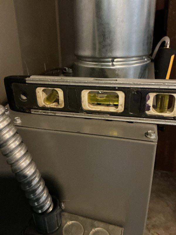 Completed installation of 80% AFUE, 90,000 BTU two-stage furnace in basement utility area. Installed custom metal 5-inch filter rack sized 16x25 to accommodate proper air filtration requirements. Connected natural gas supply line to furnace gas valve and verified proper pressure and leak-free operation. Completed electrical connections from main panel to furnace control board, ensuring proper voltage and amperage for unit operation. Installed and programmed new thermostat for optimal two-stage heating control. Configured ductwork connections including supply and return plenums with proper sealing and insulation. Leveled and secured unit to manufacturer specifications for proper operation and condensate drainage. Verified all electrical connections, gas connections, and venting meet current code requirements. Tested furnace operation through complete heating cycle, confirming both low and high-stage firing sequences function correctly. System operating as designed with proper airflow an