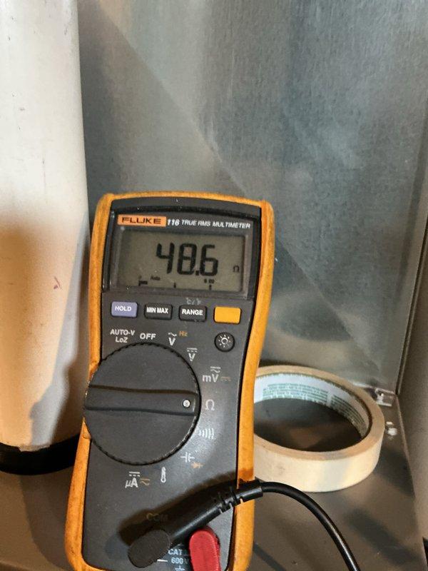 Performed routine maintenance on a 4-year-old furnace located in the basement. Verified system operation, checked electrical parameters reading 48.6 millivolts on the flame sensor circuit, and confirmed proper unit levelness to ensure optimal performance and drainage.