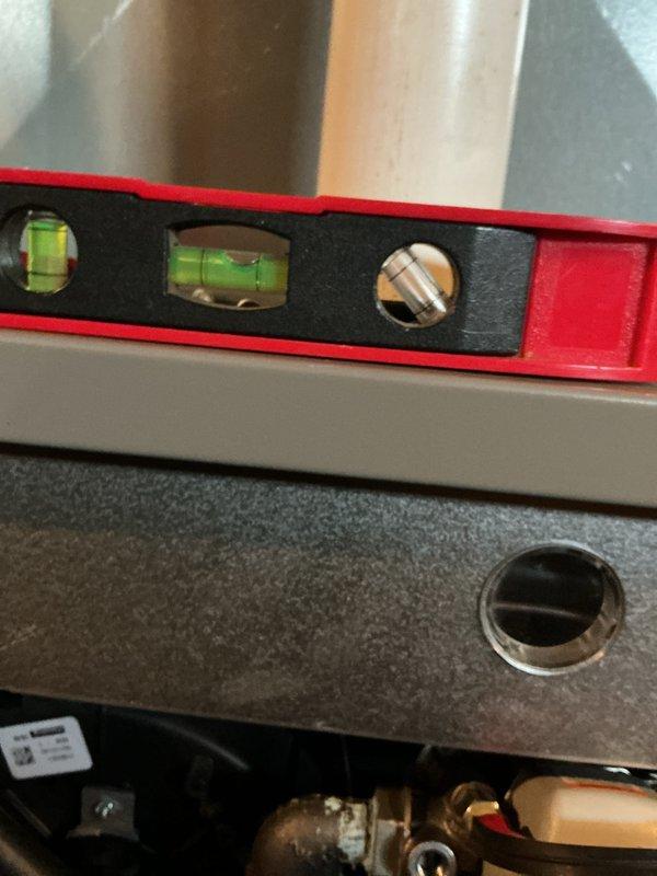 Performed routine maintenance on a 4-year-old furnace located in the basement. Verified system operation, checked electrical parameters reading 48.6 millivolts on the flame sensor circuit, and confirmed proper unit levelness to ensure optimal performance and drainage.