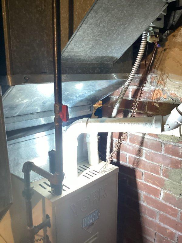 Completed furnace replacement estimate for existing York HVAC system located in basement mechanical room. Assessed current equipment configuration, ductwork connections, and installation requirements including gas line access, electrical connections, and venting system compatibility. Documented existing unit specifications and spatial constraints for proper sizing and replacement recommendations.