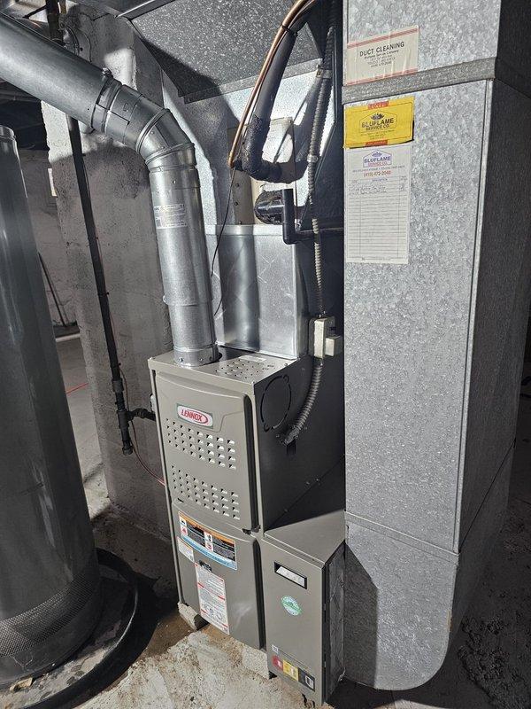 Completed installation of Lennox upflow gas furnace rated at 80% AFUE and 45,000 BTU capacity in basement utility area. Installation included metal 12-gallon humidifier, 5-inch filter rack, 120V condensate pump with discharge piping, new dedicated electrical wiring, and WiFi-enabled thermostat. All ductwork connections, gas piping, venting, and electrical terminations completed per manufacturer specifications and local code requirements, with system tested and operational upon completion.