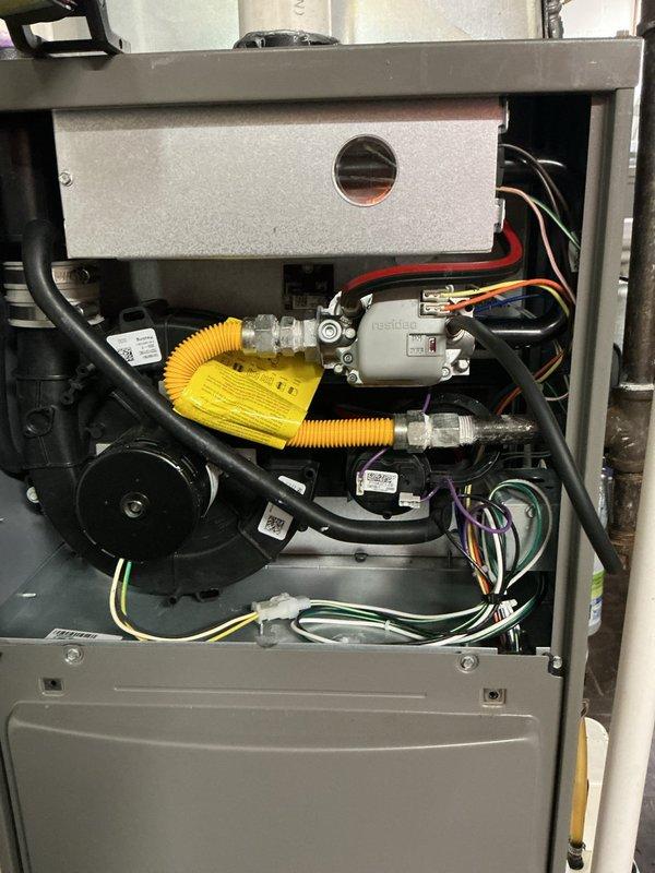 Performed comprehensive tune-up on 2-year-old residential gas furnace system. Conducted visual inspection of internal components including gas valve assembly, CSST flexible gas line connections, blower motor assembly, and all electrical connections. Verified proper operation of all safety controls, confirmed secure wire terminations, and documented equipment condition through photographic documentation.