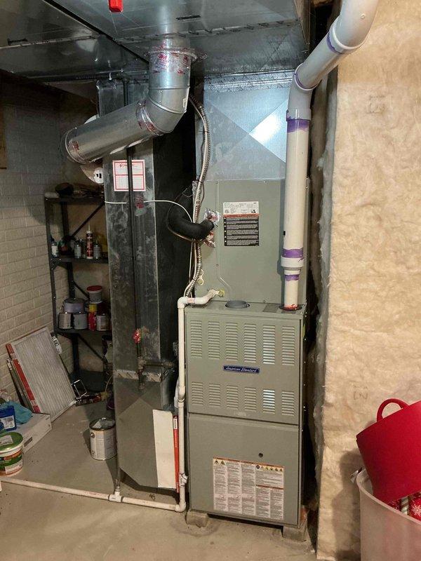 Completed scheduled maintenance tune-up on a 2-year-old residential gas furnace system with integrated humidifier. Performed comprehensive inspection of all components, verified proper operation of heating system and humidification equipment, checked ductwork connections, and confirmed system is functioning within manufacturer specifications.