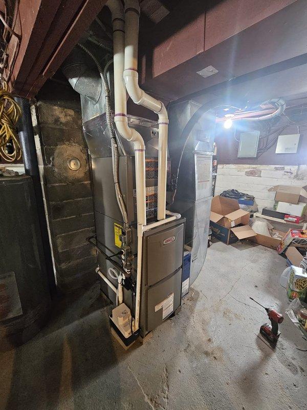 Completed full HVAC system replacement including installation of upflow 90% efficiency Lennox Merit furnace with 2" venting system extending approximately 30 feet. Installed upflow cased coil rated at 2 tons with required metal supply and return connections. Replaced lineset with new 3/4" x 3/8" x 30' copper lines and installed 13 SEER single-stage condenser unit on new equipment pad. Completed electrical work including new disconnect box and supply whip for outdoor unit. Installed new programmable thermostat and verified all system components operational. System tested for proper airflow, refrigerant charge, and combustion efficiency with all parameters meeting manufacturer specifications.