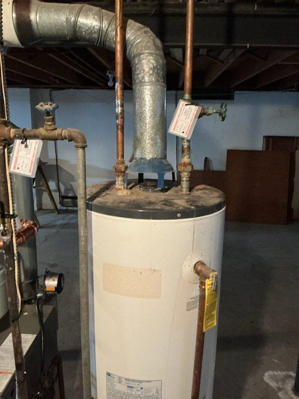 # Boiler Maintenance Service Completed

Performed comprehensive annual maintenance on residential boiler system. Conducted thorough inspection of all major components including heat exchanger, burner assembly, and flue connections. Cleaned and tested safety controls, verified proper venting through exhaust system, and inspected all copper supply and return piping for signs of corrosion or leaks. Checked all brass fittings and valves for proper operation and seal integrity. Confirmed adequate combustion air supply and proper draft through the venting system. System tested and operating within manufacturer specifications upon completion.